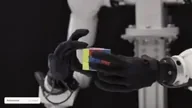 Genesis AI Proprietary dexterous hand — GENE-26.5 system